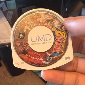 Sony PSP UMD Disc with Brown and Red Monster Artwork Japanese
